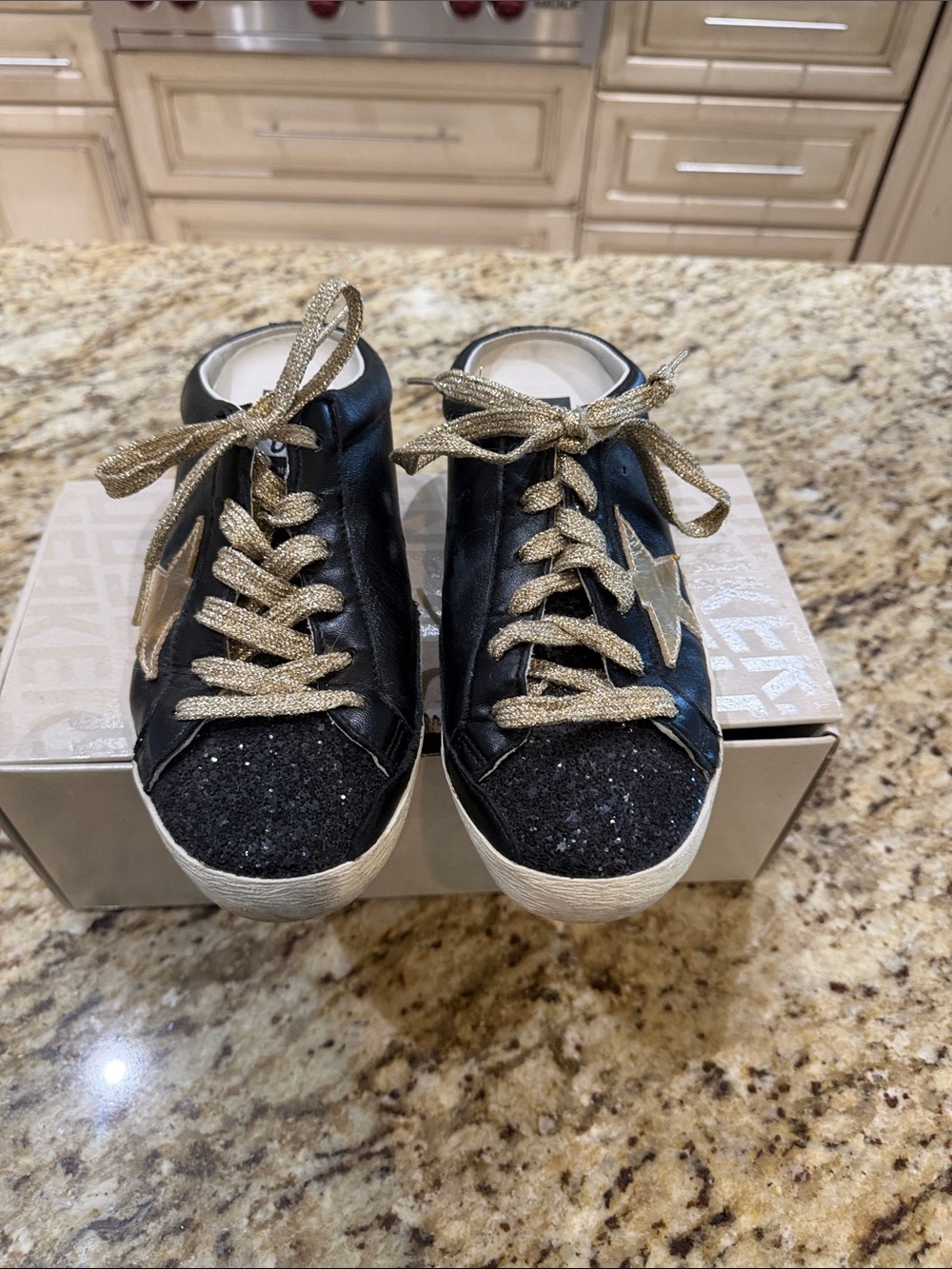 Golden Goose Black and Gold Super-Star Sabot